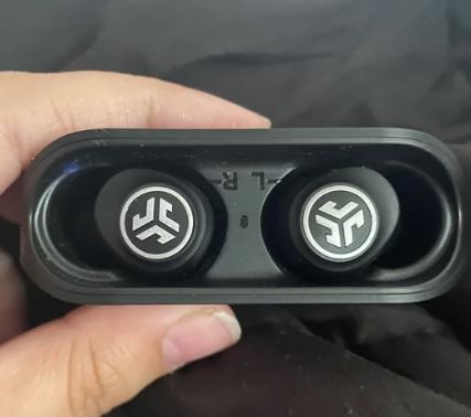 align your JLab Go Air earbuds properly inside the case 